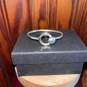 Handmade by a local blacksmith child size button bracelet. Sterling Silver